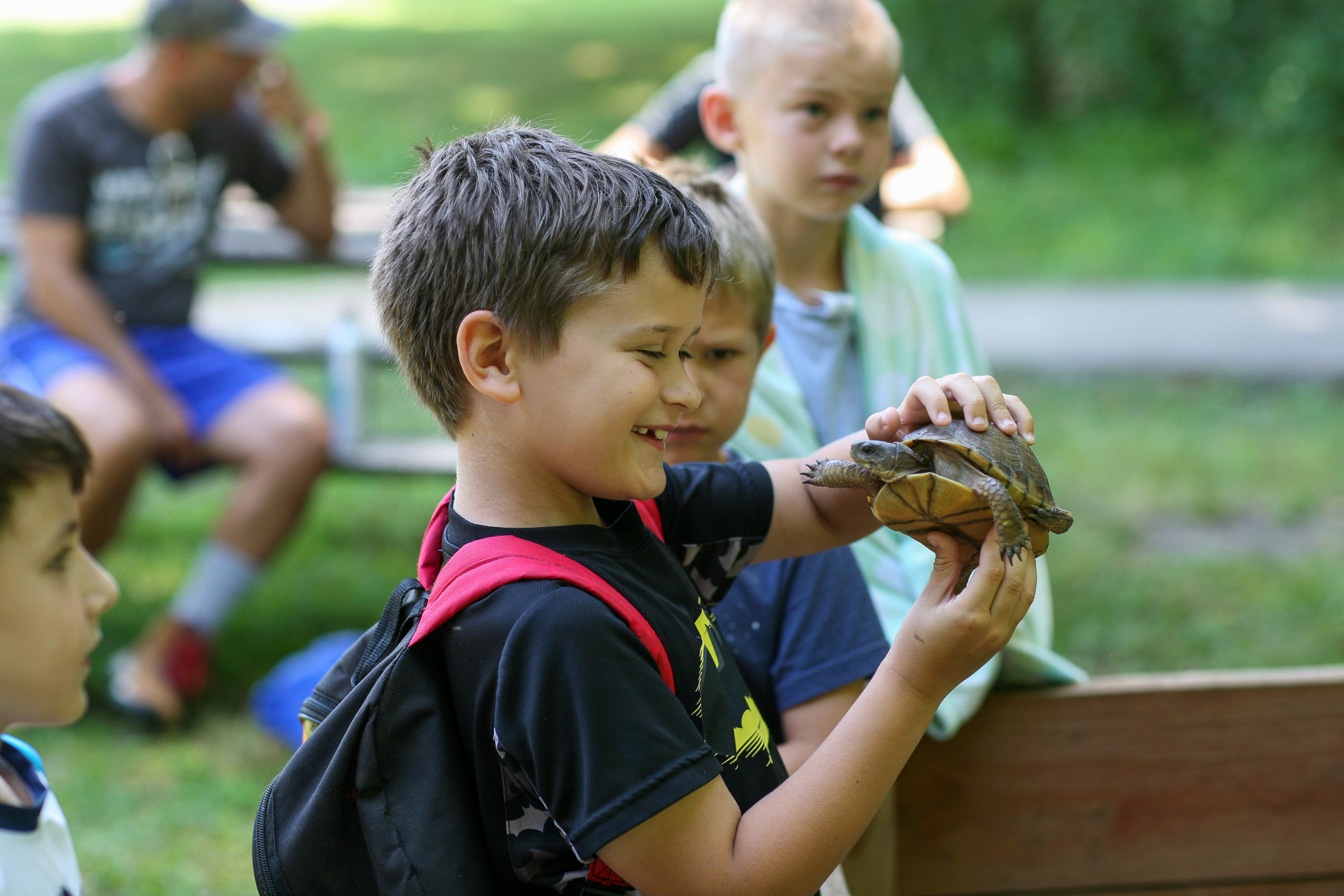 Nature Programs scouts with turtle photo